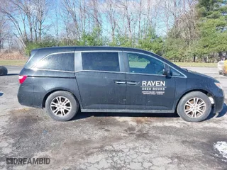 2012 Honda Odyssey EX-L with VIN 5FNRL5H69CB084295, listed as a IAAI auction lot 41983366 with 184,417 mi miles. Bid and sale history available at carsss.com. Image 14.