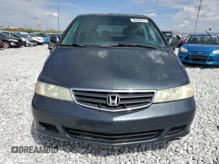 2003 Honda Odyssey EX-L z VIN 5FNRL18943B020961, wystawiony jako Copart lot #86009874 z przebiegiem 155 993 mil mil oraz Szkoda całkowita • Salvage title. Historia ofert i sprzedaży dostępna na DreamBid. Obrazek 5.