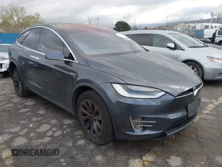 2016 Tesla Model X P90D with VIN 5YJXCBE42GF000185, listed as a IAAI auction lot 41703440 with 105,680 mi miles. Bid and sale history available at carsss.com. Image 1.