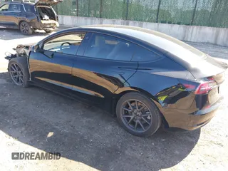 2023 Tesla Model 3 Long Range with VIN 5YJ3E1EB1PF632595, listed as a IAAI auction lot 41754131 with 8,147 mi miles and . Bid and sale history available at DreamBid. Image 3.