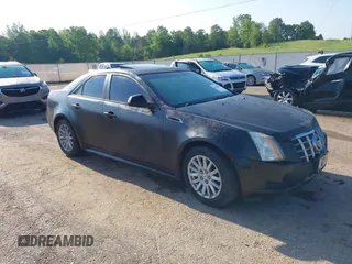 2012 Cadillac CTS z VIN 1G6DA5E51C0152943, wystawiony jako IAAI lot #42116892 z przebiegiem 176 049 mil mil oraz . Historia ofert i sprzedaży dostępna na DreamBid. Obrazek 1.