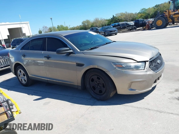 2015 Ford Police Interceptor with VIN 1FAHP2L89FG162131, listed as a IAAI auction lot 41740659 with 124,537 mi miles and . Bid and sale history available at DreamBid. Image 13.