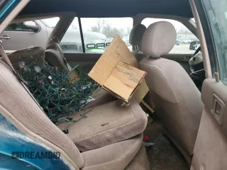 1994 Ford Escort z VIN 1FARP15J1RW125762, wystawiony jako Copart lot #85853184 z przebiegiem 75 229 mil mil oraz Szkoda całkowita • Salvage title. Historia ofert i sprzedaży dostępna na DreamBid. Obrazek 10.