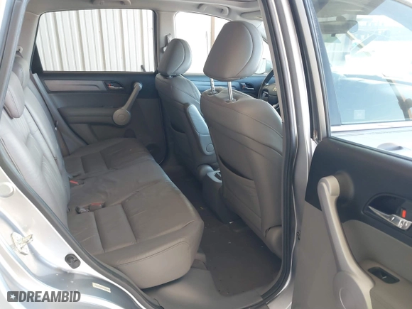 2007 Honda CR-V EX-L with VIN JHLRE387X7C069804, listed as a IAAI auction lot 41616256 with 136,271 mi miles. Bid and sale history available at carsss.com. Image 8.