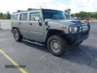 2003 Hummer H2 z VIN 5GRGN23U63H131139, wystawiony jako IAAI lot #42540561 z przebiegiem 182 365 mil mil oraz . Historia ofert i sprzedaży dostępna na DreamBid. Obrazek 1.