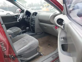 2002 Hyundai Santa Fe GLS with VIN KM8SC73D72U306997, listed as a IAAI auction lot 41519773 with 244,398 mi miles. Bid and sale history available at carsss.com. Image 5.