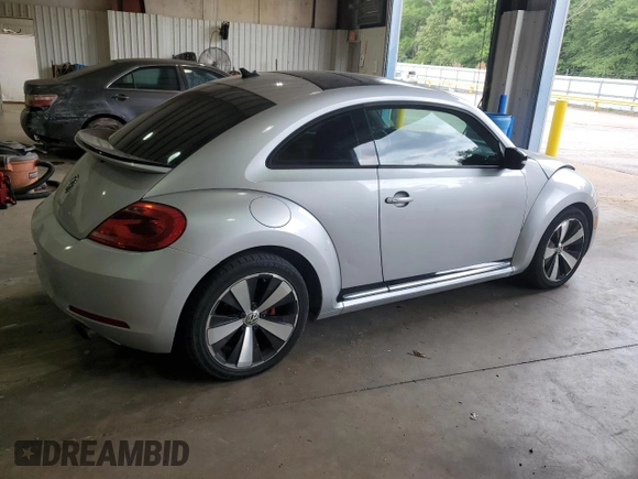 2012 Volkswagen Beetle with VIN 3VWV67AT1CM663839, listed as a Copart auction lot 55009455 with 122,042 mi miles and Salvage Title. Bid and sale history available at DreamBid. Image 3.