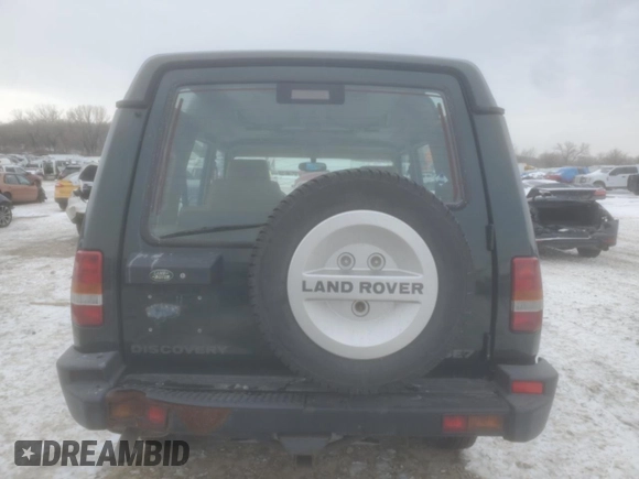 1996 Land Rover Discovery SD z VIN SALJY1243TA190869, wystawiony jako Copart lot #45007455 z przebiegiem 97 302 mil mil oraz Szkoda całkowita • Salvage title. Historia ofert i sprzedaży dostępna na DreamBid. Obrazek 6.