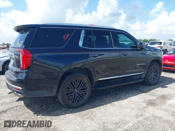 2021 GMC Yukon Denali with VIN 1GKS2DKL7MR471280, listed as a IAAI auction lot 40189766 with 126,591 mi miles. Bid and sale history available at carsss.com. Image 4.