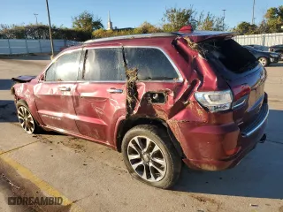 2017 Jeep Grand Cherokee Overland with VIN 1C4RJECG2HC868313, listed as a Copart auction lot 79510394 with 111,624 mi miles and Salvage Title. Bid and sale history available at carsss.com. Image 2.