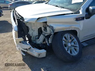 2020 GMC Sierra 1500 Denali with VIN 3GTU9FET8LG287861, listed as a IAAI auction lot 40678227 with 155,333 mi miles and . Bid and sale history available at carsss.com. Image 6.