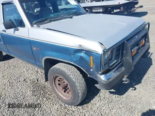 1988 Ford Ranger with VIN 1FTCR15T9JPC14361, listed as a IAAI auction lot 42030315 with 32,201 mi miles. Bid and sale history available at carsss.com. Image 6.