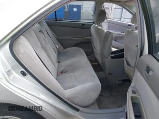 2003 Toyota Camry LE z VIN 4T1BF32K33U044476, wystawiony jako IAAI lot #42464651 z przebiegiem 206 004 mil mil oraz . Historia ofert i sprzedaży dostępna na DreamBid. Obrazek 8.