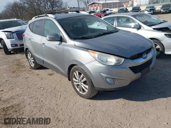2013 Hyundai Tucson GLS with VIN KM8JU3AC0DU572232, listed as a IAAI auction lot 41724332 with 232,661 mi miles. Bid and sale history available at carsss.com. Image 1.