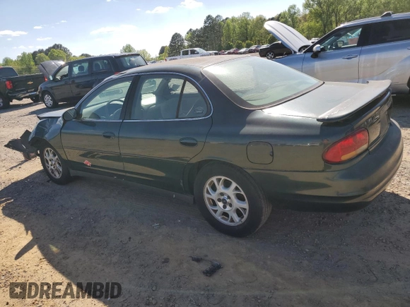 2000 Oldsmobile Intrigue GX z VIN 1G3WH52H3YF336012, wystawiony jako Copart lot #53078445 z przebiegiem 119 039 mil mil oraz Szkody całkowita. Historia ofert i sprzedaży dostępna na DreamBid. Obrazek 2.