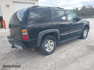 2004 Chevrolet Tahoe LT with VIN 1GNEC13Z74J314927, listed as a IAAI auction lot 41231288 with 195,809 mi miles. Bid and sale history available at carsss.com. Image 4.