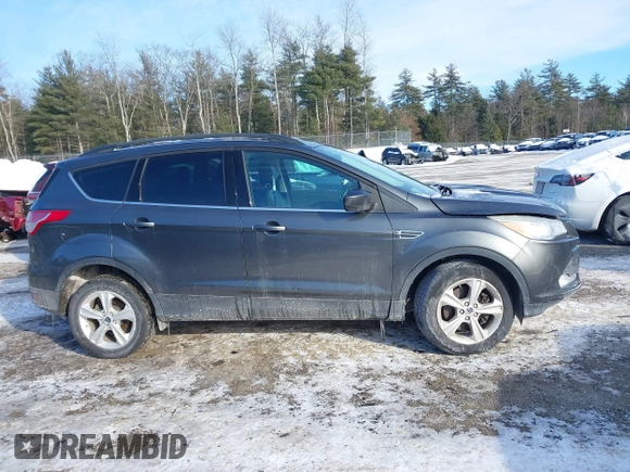 2016 Ford Escape SE with VIN 1FMCU9GX1GUC32307, listed as a IAAI auction lot 41395399 with 142,664 mi miles. Bid and sale history available at carsss.com. Image 13.