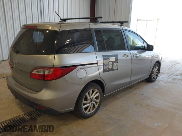 2015 Mazda 5 Sport with VIN JM1CW2BL0F0185433, listed as a IAAI auction lot 42594468 with 189,696 mi miles and . Bid and sale history available at DreamBid. Image 4.