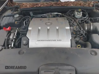 2004 Cadillac DeVille z VIN 1G6KD54Y74U236897, wystawiony jako IAAI lot #42058904 z przebiegiem 75 226 mil mil oraz . Historia ofert i sprzedaży dostępna na DreamBid. Obrazek 10.