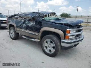 1999 Chevrolet Tahoe with VIN 3GNEK18R0XG106650, listed as a Copart auction lot 63455944 with 158,146 mi miles and Non Repairable. Bid and sale history available at carsss.com. Image 4.