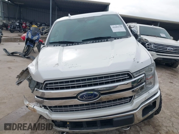 2018 Ford F-150 XL with VIN 1FTEW1EG6JKC69383, listed as a IAAI auction lot 41602736 with 96,879 mi miles and . Bid and sale history available at DreamBid. Image 13.