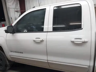 2018 Chevrolet Silverado 1500 LT with VIN 1GCRCREHXJZ288155, listed as a IAAI auction lot 41959980 with 114,919 mi miles and . Bid and sale history available at DreamBid. Image 14.