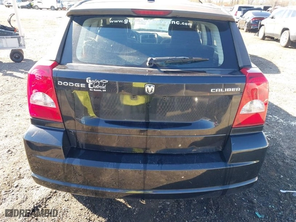 2011 Dodge Caliber Mainstreet with VIN 1B3CB3HA8BD192559, listed as a IAAI auction lot 41855432 with 253,003 mi miles. Bid and sale history available at carsss.com. Image 19.