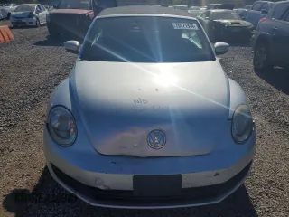 2013 Volkswagen Beetle 2.5L with VIN 3VW5P7ATXDM803952, listed as a Copart auction lot 76971934 with 211,449 mi miles and Salvage Title. Bid and sale history available at DreamBid. Image 5.