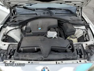 2015 BMW 2 Series 228i with VIN WBA1F5C52FV256575, listed as a Copart auction lot 88515575 with 127,012 mi miles and Salvage Title. Bid and sale history available at carsss.com. Image 12.