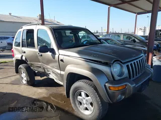 2004 Jeep Liberty Limited with VIN 1J4GL58K64W254155, listed as a IAAI auction lot 41350175 with 165,822 mi miles. Bid and sale history available at carsss.com. Image 13.