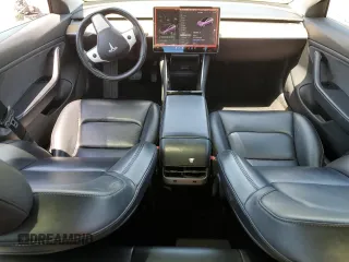 2019 Tesla Model 3 Mid Range z VIN 5YJ3E1EA3KF402556, wystawiony jako Copart lot #56212875 z przebiegiem 89 022 mil mil oraz Szkoda całkowita • Salvage title. Historia ofert i sprzedaży dostępna na DreamBid. Obrazek 8.