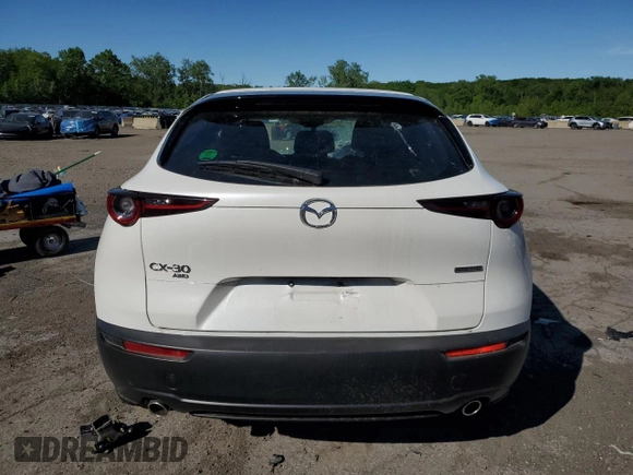 2023 Mazda CX-30 S with VIN 3MVDMBAM0PM506565, listed as a Copart auction lot 57699125 with 7,345 mi miles and Salvage title. Bid and sale history available at DreamBid. Image 6.