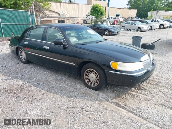 2001 Lincoln Town Car Signature with VIN 1LNHM82W11Y613959, listed as a IAAI auction lot 42432229 with 144,660 mi miles and . Bid and sale history available at DreamBid. Image 1.