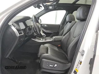 2019 BMW X5 xDrive40i with VIN 5UXCR6C5XKLL04806, listed as a Copart auction lot 63689815 with 70,108 mi miles and Clean title. Bid and sale history available at DreamBid. Image 7.
