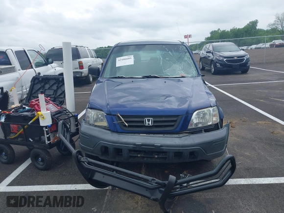 1999 Honda CR-V LX z VIN JHLRD2846XC021574, wystawiony jako IAAI lot #42106605 z przebiegiem 131 001 mil mil oraz . Historia ofert i sprzedaży dostępna na DreamBid. Obrazek 6.