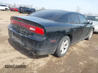 2014 Dodge Charger SE with VIN 2C3CDXBG4EH268898, listed as a IAAI auction lot 41790753 with 318,732 mi miles and . Bid and sale history available at DreamBid. Image 4.