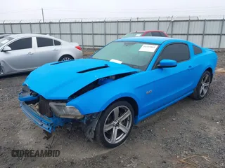 2013 Ford Mustang GT with VIN 1ZVBP8CF4D5268218, listed as a IAAI auction lot 41555868 with 219,385 mi miles. Bid and sale history available at carsss.com. Image 6.