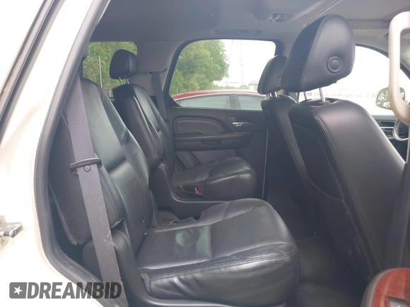 2007 Cadillac Escalade z VIN 1GYFK63827R333227, wystawiony jako IAAI lot #42253138 z przebiegiem 111 592 mil mil oraz . Historia ofert i sprzedaży dostępna na DreamBid. Obrazek 8.