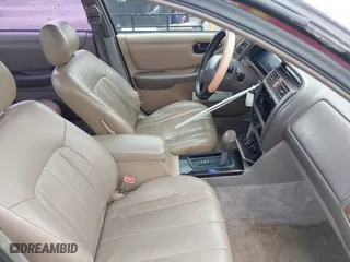1997 Toyota Avalon XL with VIN 4T1BF12B5VU185685, listed as a IAAI auction lot 42037605 with 150,999 mi miles. Bid and sale history available at carsss.com. Image 5.