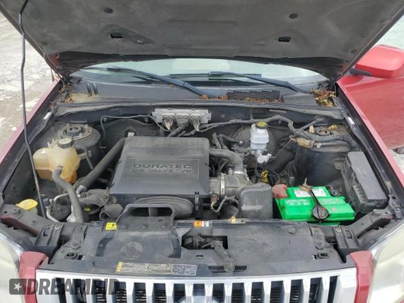 2009 Mercury Mariner Premier with VIN 4M2CU97G39KJ11050, listed as a Copart auction lot 57131665 with 201,602 mi miles and Salvage title. Bid and sale history available at DreamBid. Image 12.