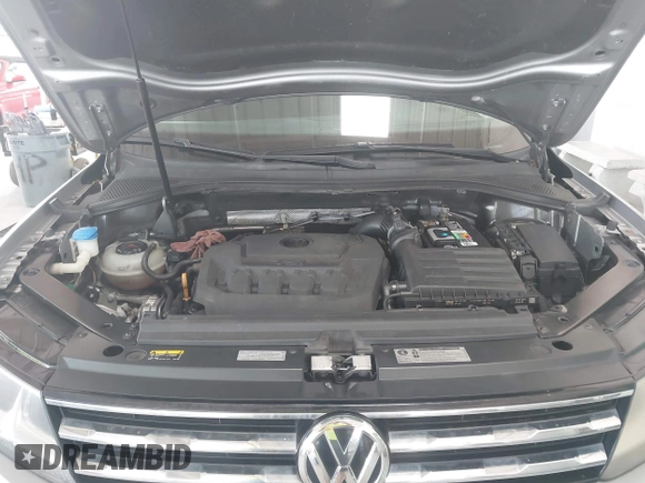 2019 Volkswagen Tiguan S with VIN 3VV1B7AX6KM189497, listed as a IAAI auction lot 42669313 with 236,719 mi miles and . Bid and sale history available at DreamBid. Image 10.