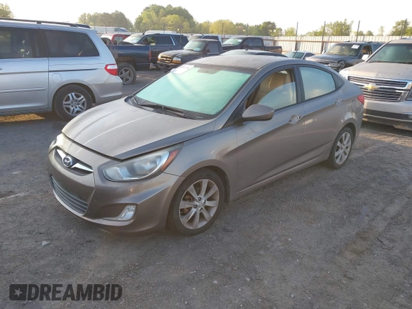 2012 Hyundai Accent GLS with VIN KMHCU4AE4CU097425, listed as a IAAI auction lot 42052740 with 244,705 mi miles. Bid and sale history available at carsss.com. Image 2.