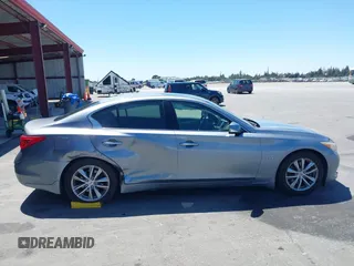 2014 Infiniti Q50 Premium with VIN JN1BV7AP0EM676949, listed as a IAAI auction lot 42684403 with 186,135 mi miles and . Bid and sale history available at DreamBid. Image 13.