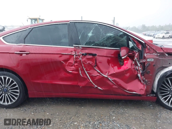 2018 Ford Fusion Titanium with VIN 3FA6P0D91JR233679, listed as a IAAI auction lot 42182140 with 100,706 mi miles and . Bid and sale history available at DreamBid. Image 13.