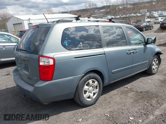 2009 Kia Sedona LX with VIN KNDMB233696299758, listed as a IAAI auction lot 41929906 with 214,445 mi miles. Bid and sale history available at carsss.com. Image 4.