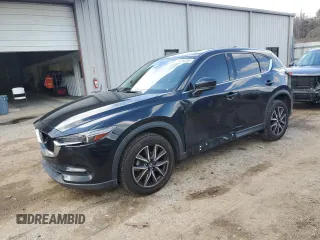 2017 Mazda CX-5 Grand Touring with VIN JM3KFBDL2H0197831, listed as a Copart auction lot 43150335 with 126,847 mi miles and Salvage Title. Bid and sale history available at carsss.com. Image 1.