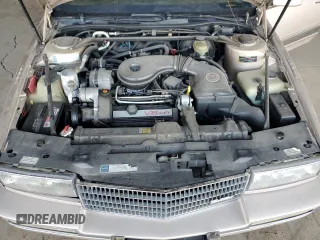 1991 Cadillac Seville z VIN 1G6KS53B5MU825563, wystawiony jako Copart lot #81541154 z przebiegiem 93 284 mil mil oraz Czysty tytuł • Clean title. Historia ofert i sprzedaży dostępna na DreamBid. Obrazek 11.
