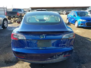 2023 Tesla Model 3 Long Range with VIN 5YJ3E1EB5PF623706, listed as a IAAI auction lot 41321269 with 21,081 mi miles and . Bid and sale history available at DreamBid. Image 16.