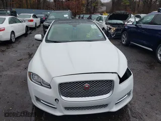 2017 Jaguar XJ with VIN SAJWA2G73H8W04310, listed as a IAAI auction lot 40914491 with 62,102 mi miles. Bid and sale history available at carsss.com. Image 12.