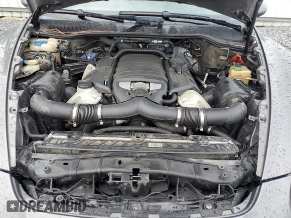2011 Porsche Cayenne S with VIN WP1AB2A2XBLA55565, listed as a Copart auction lot 63094305 with 105,250 mi miles and Salvage title. Bid and sale history available at DreamBid. Image 12.